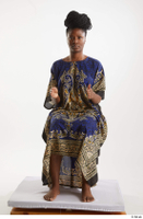  Dina Moses  1 dressed sitting traditional decora long african dress whole body 0015.jpg